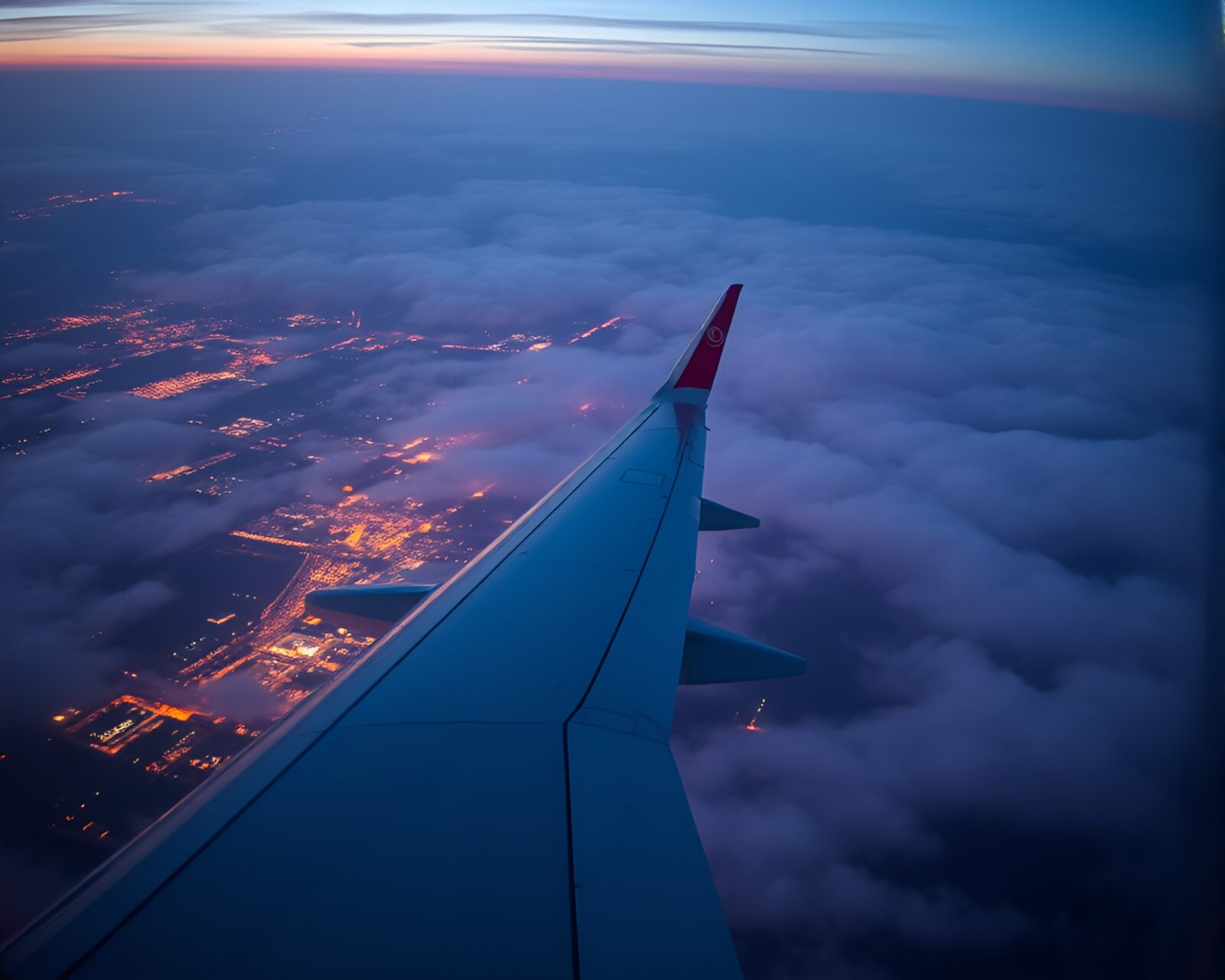 Selective color digital twilight haze airplane from above