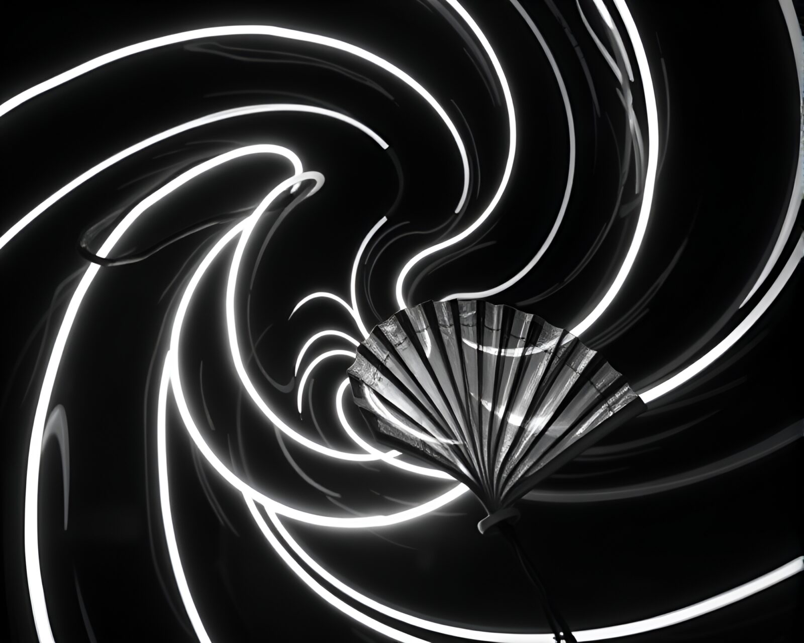 Monochrome image of a neon vortex and a hand-painted fan