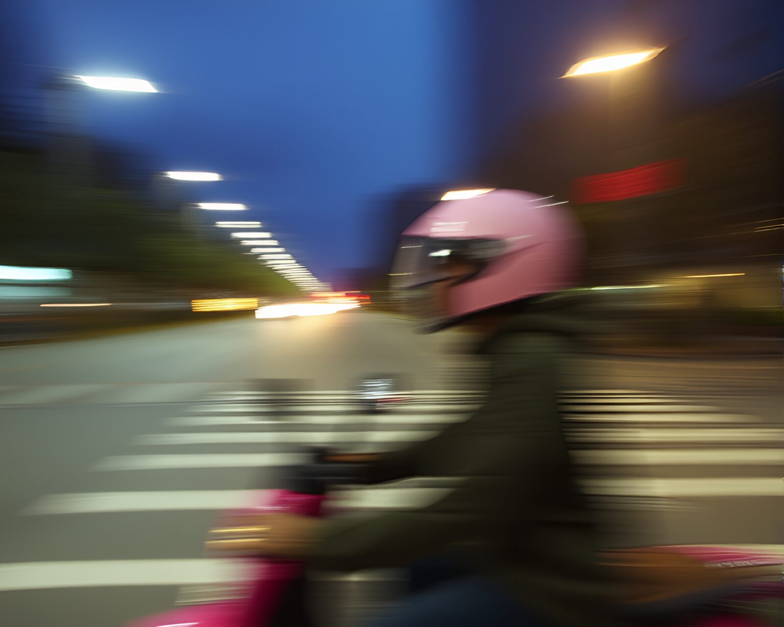 Soft blush pink helmet in gentle motion blur