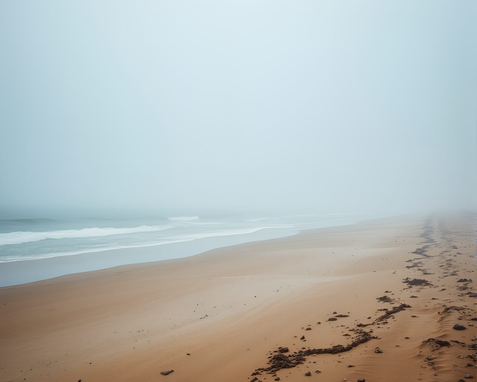 Grainy textured beach scene with misty depth layering