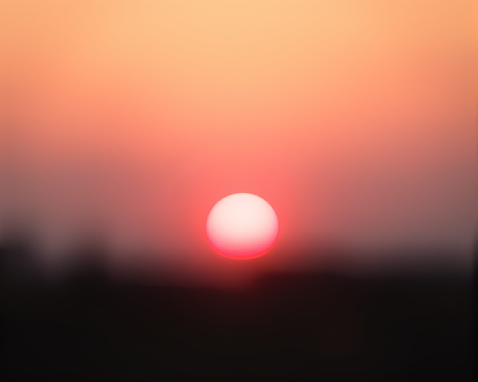 Surreal sunset scene with dreamlike split focus effect
