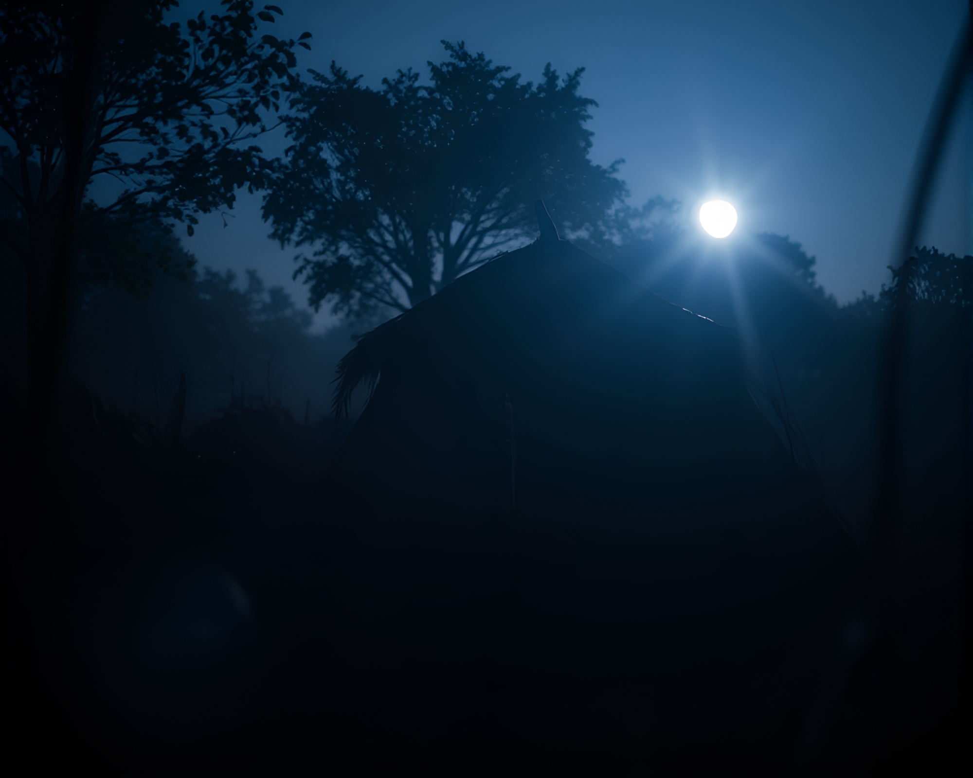 Ancient Mud Hut Bathed in Flickering CRT Light – free AI stock image