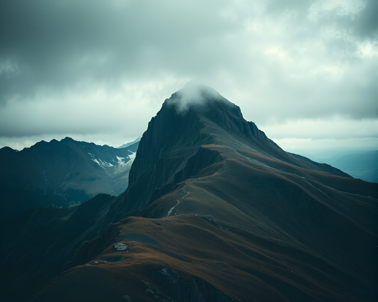 High-angle view of a serene mountain peak in vibrant colors