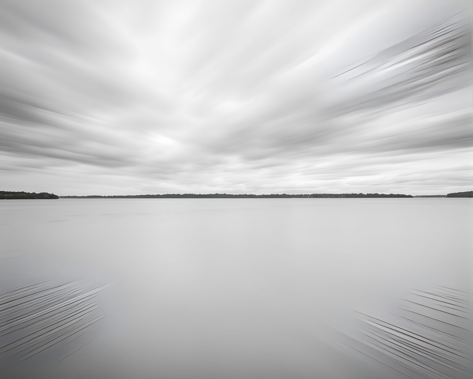 Pastel toned monochrome image of a symmetrical lakeside view