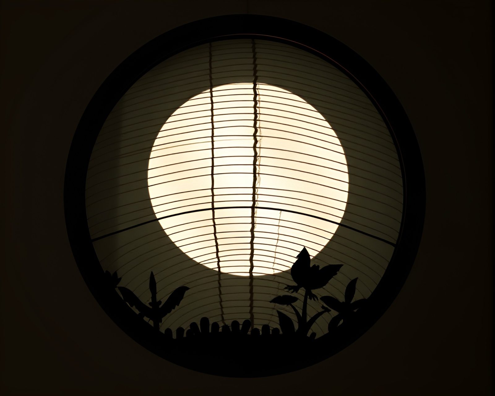 Circular frame tattoo flash art of paper lanterns in eclipse shadow