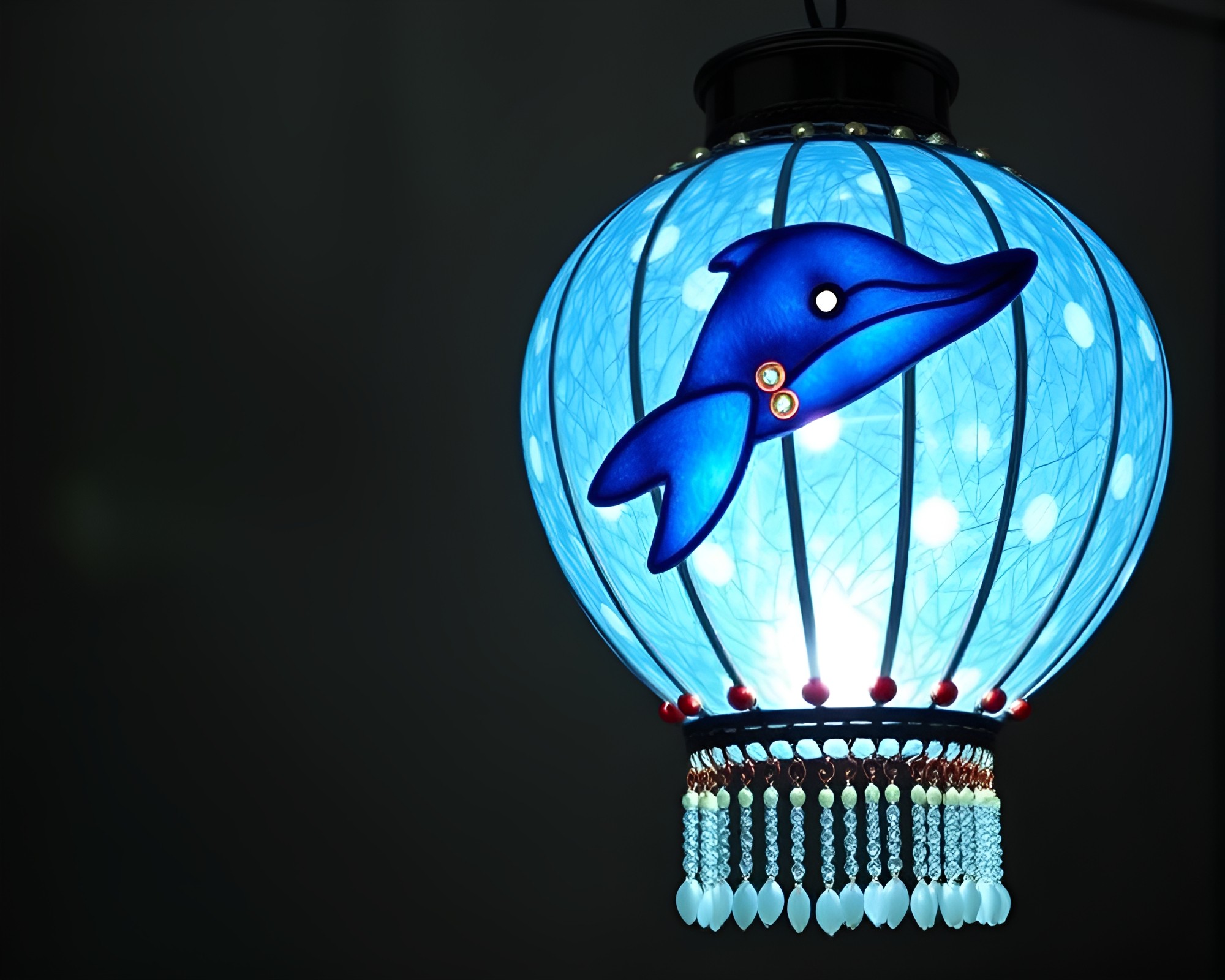 Dolphin Beadwork Under Lantern Glow – free AI stock image