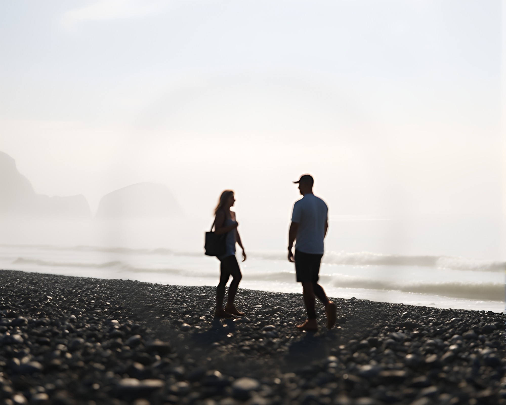 Distorted Silhouette on Hazy Pebble Beach Illustration – free AI stock image