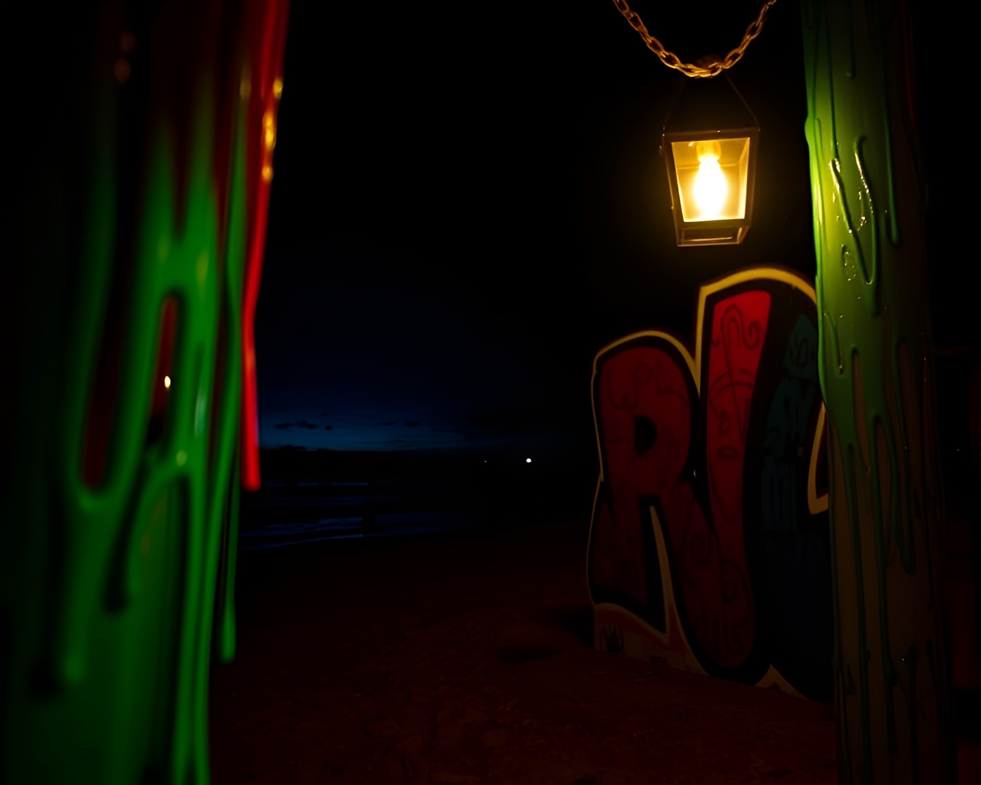 Graffiti Sunset: Beach Lantern Glow – free AI stock image