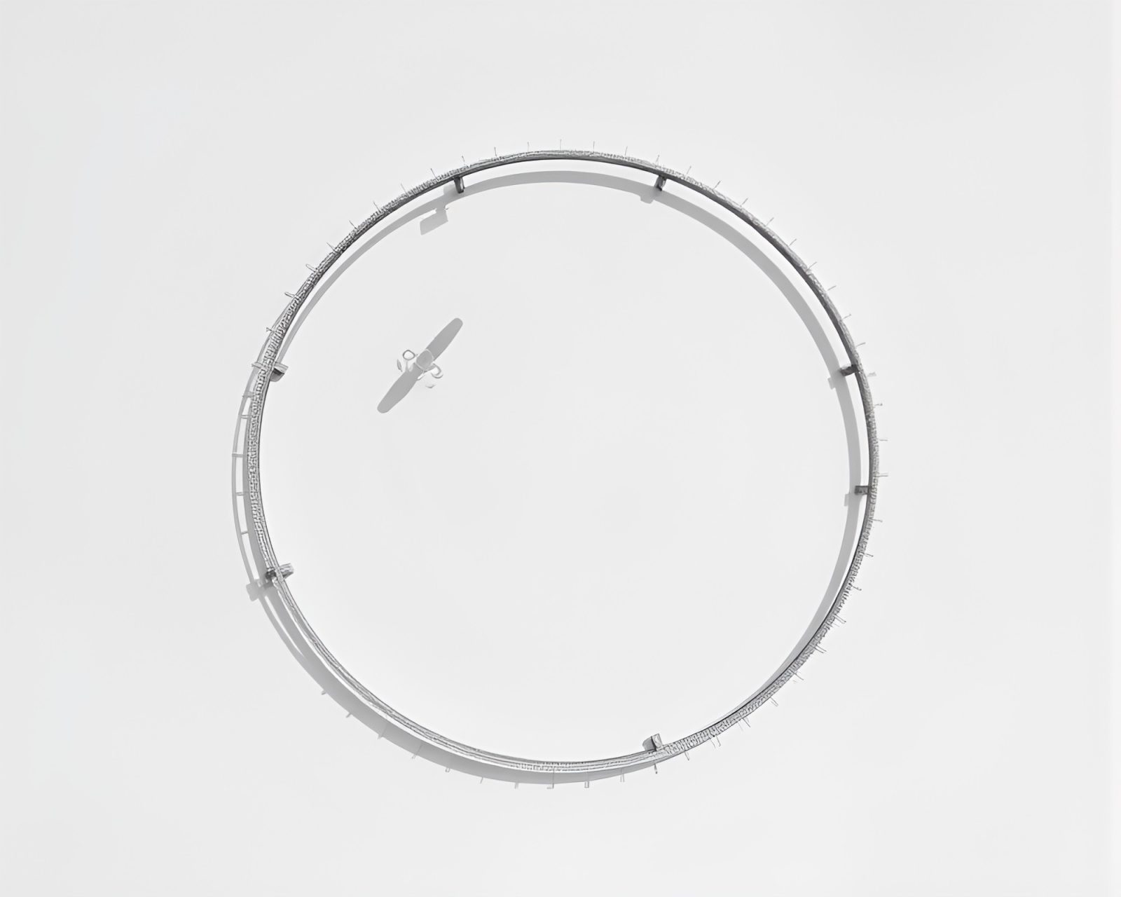 Detailed pencil drawing of an infrared drone in soft shadows