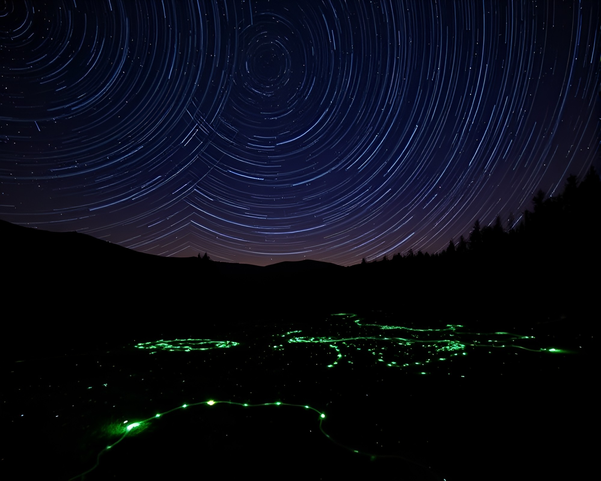 Bioluminescent Apple Cider Dance Under Star Trail Night Sky – free AI stock image