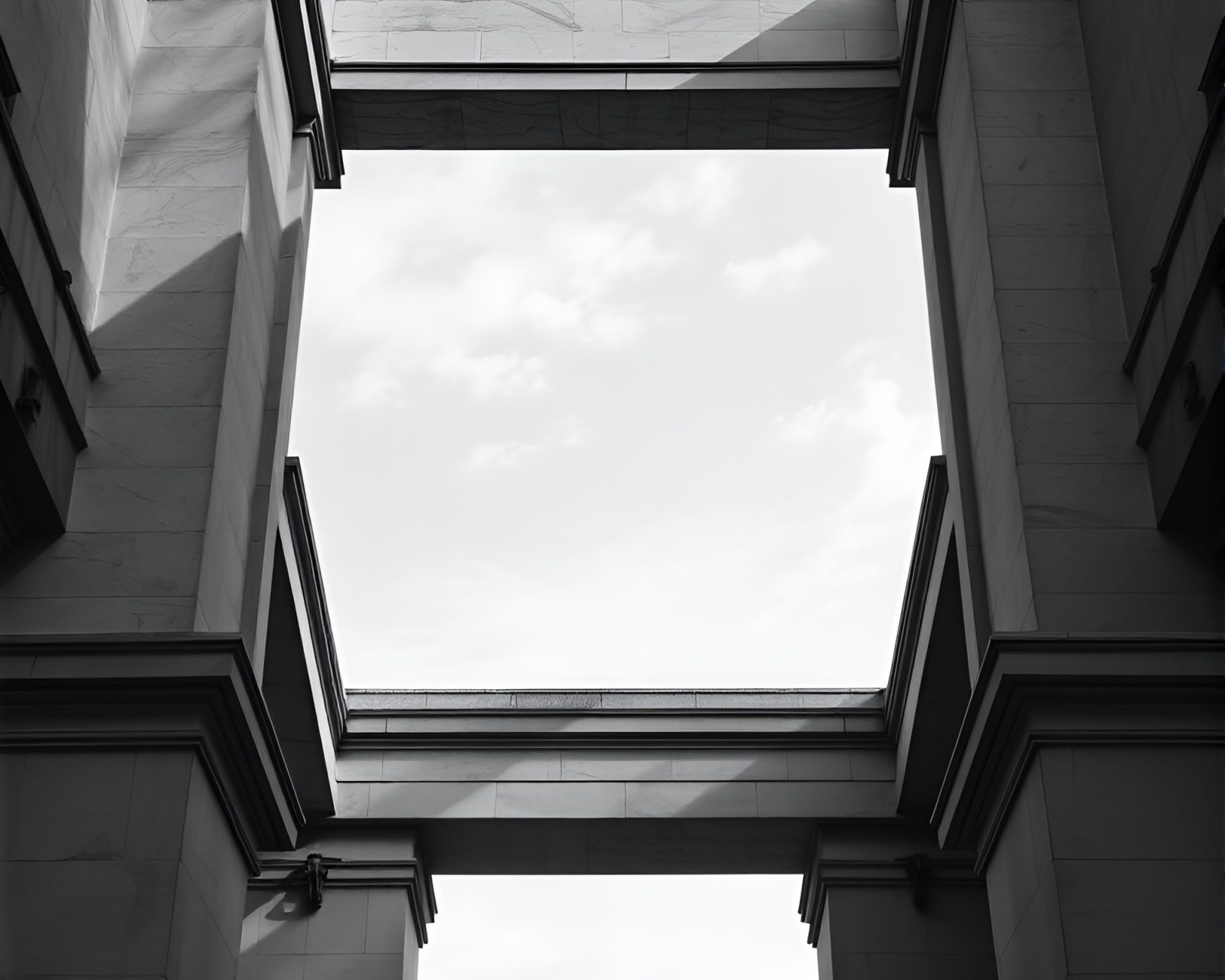 Highly saturated monochrome image of a trumpet in architectural setting
