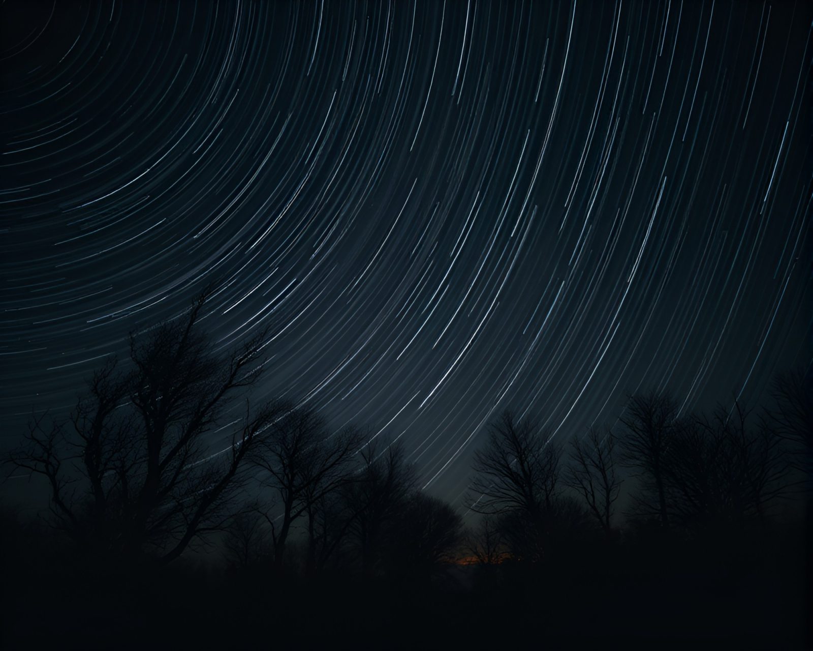 Gloomily lit scene of a siren amidst star trails