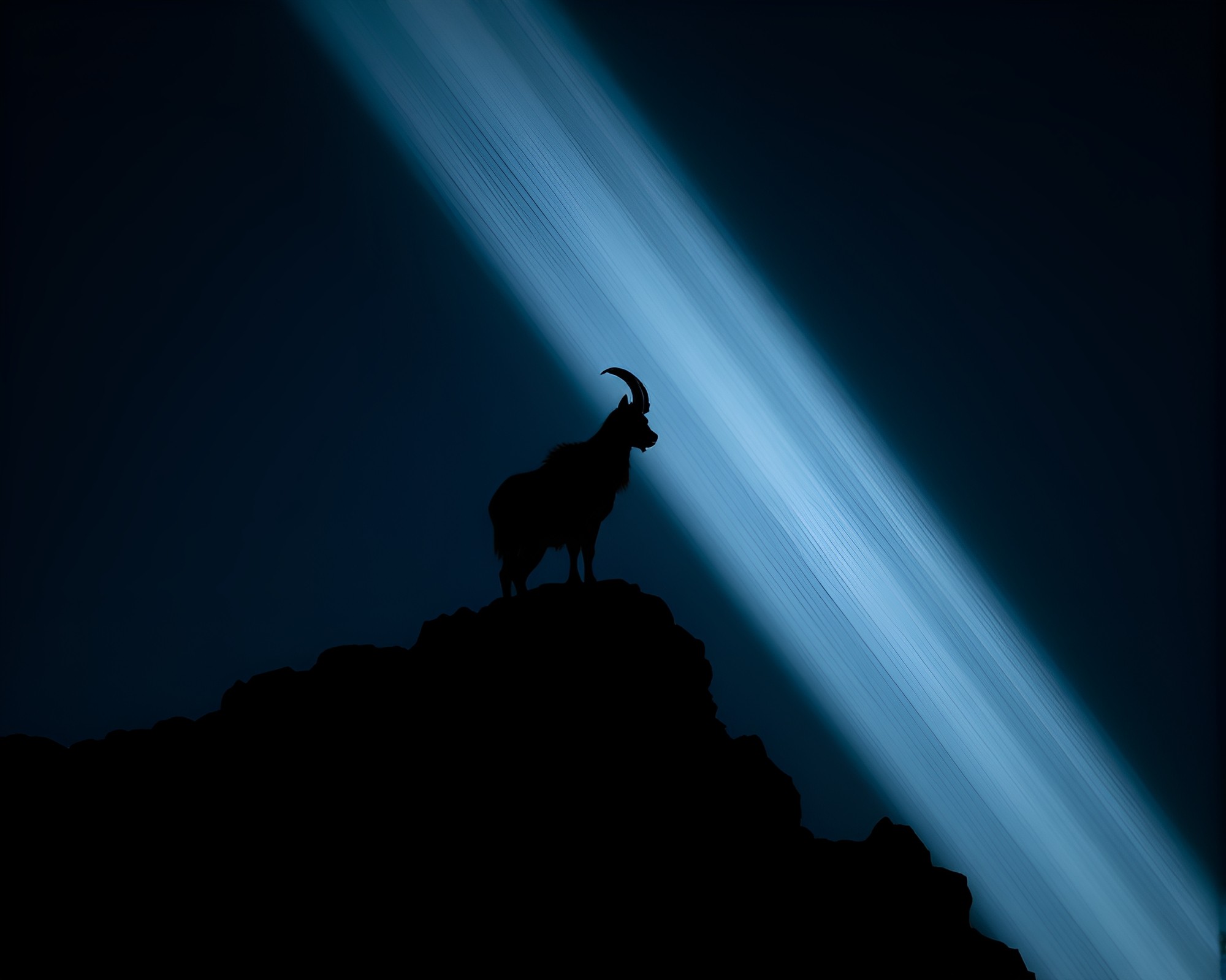 Mountain Goat Etching Lines in Spotlight Long Exposure – free AI stock image