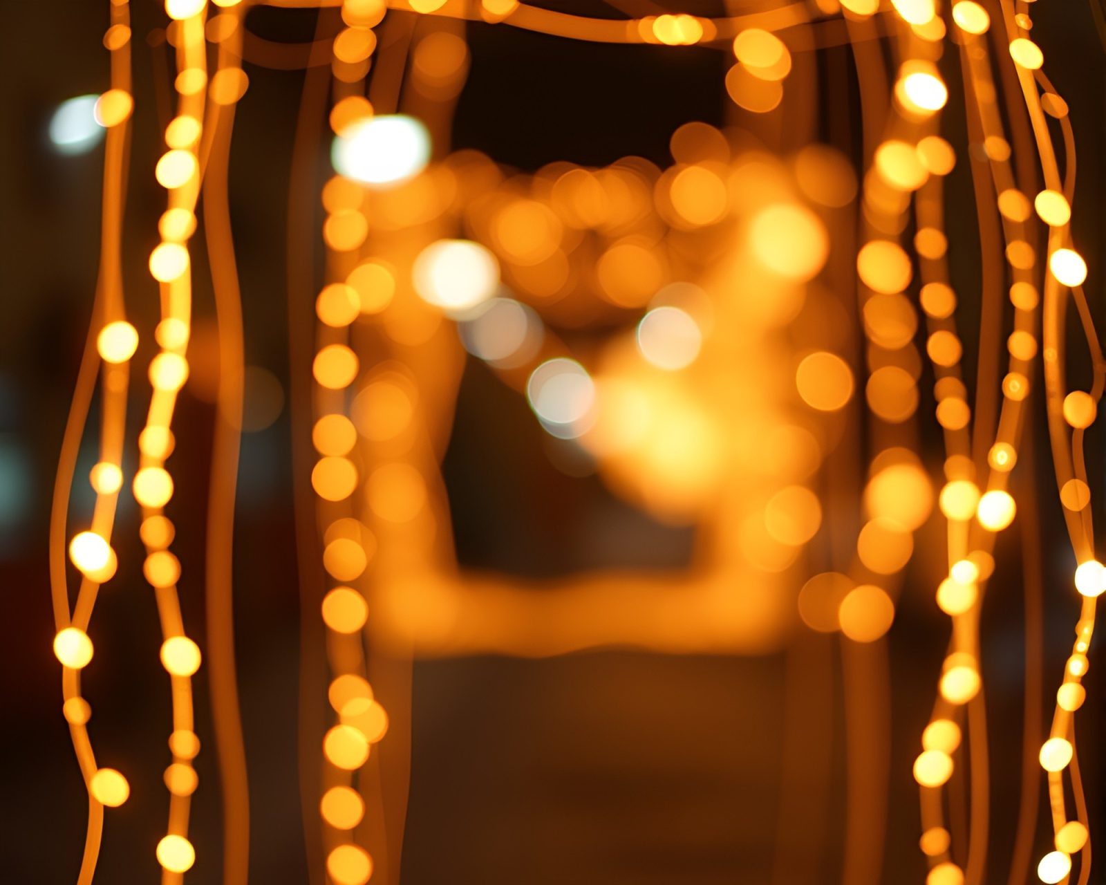 Glowing bokeh lights in intricate framed design