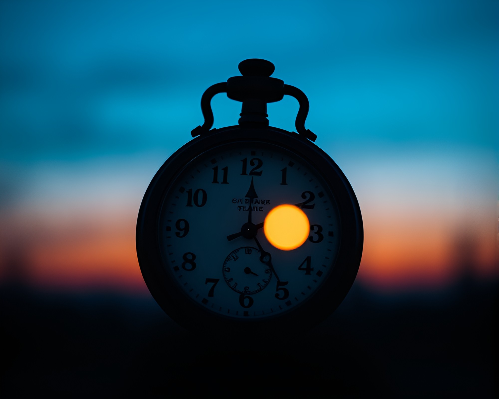 Twilight Silhouette: Vintage Pocket Watch Cross-processed – free AI stock image