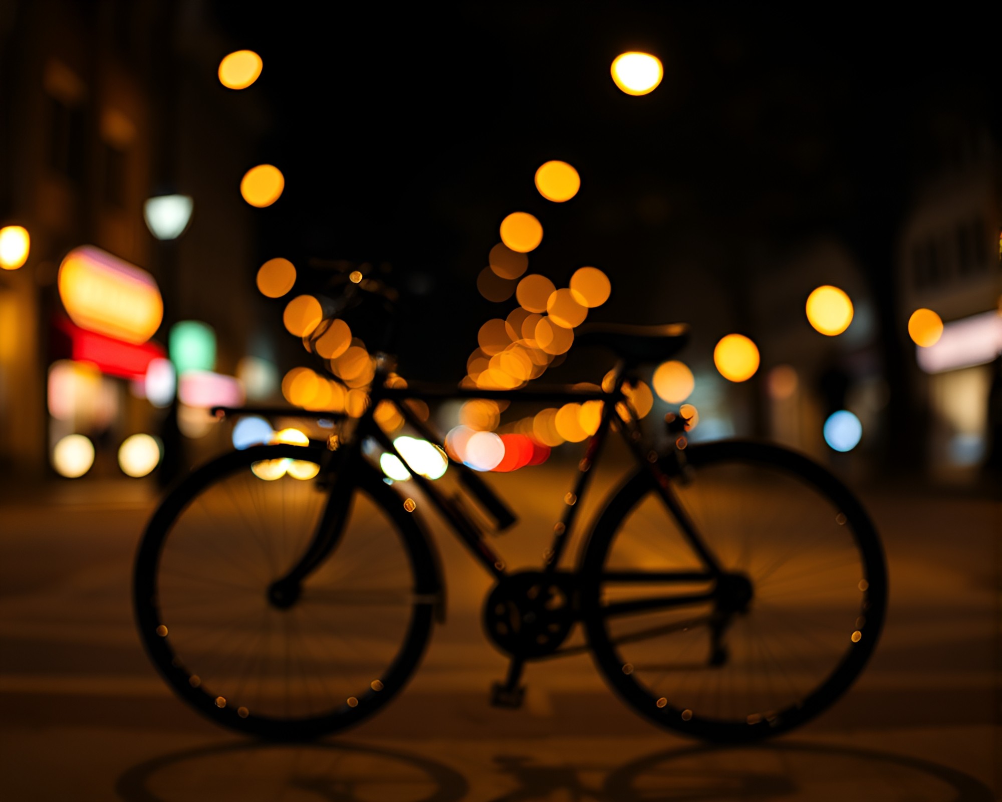 Abstract Bicycle Ride Through Bokeh Lights – free AI stock image