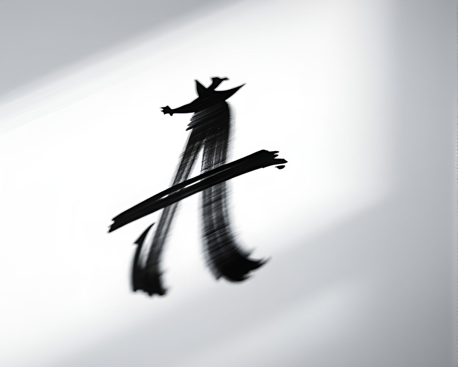 Handwritten letter vanishing into a dark calligraphic blur