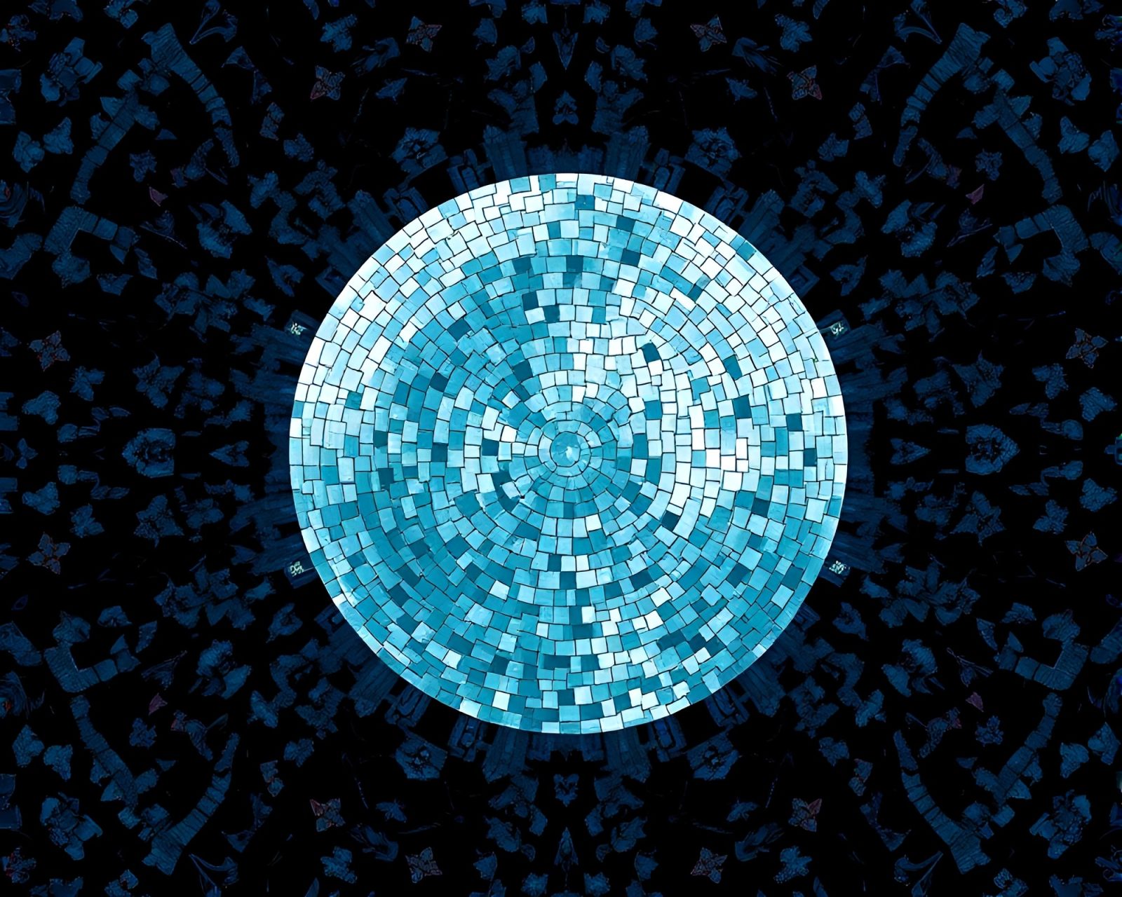 Colorful kaleidoscope mosaic under a moonlit duochrome sky