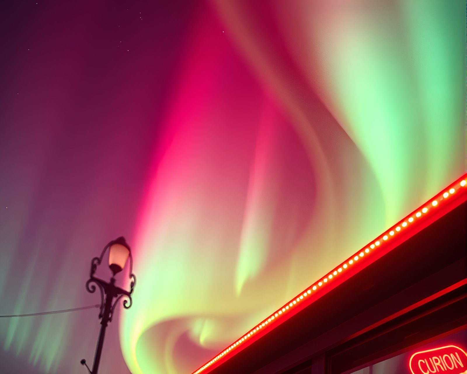High-angle view of neon cityscape in aurora hues