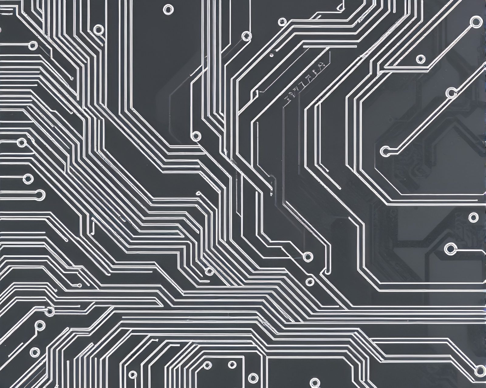 Futuristic depiction of circuit board traces in a desert setting