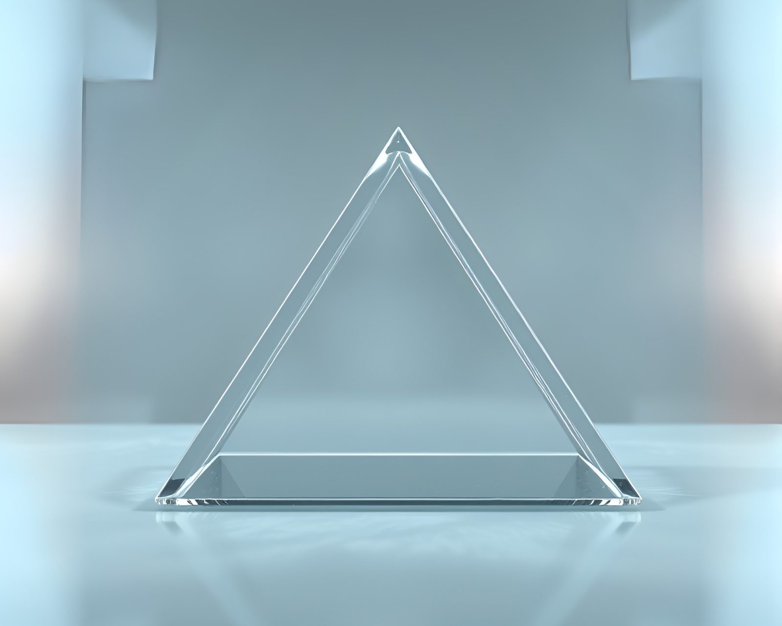 High-poly 3D glass pyramid in misty lighting