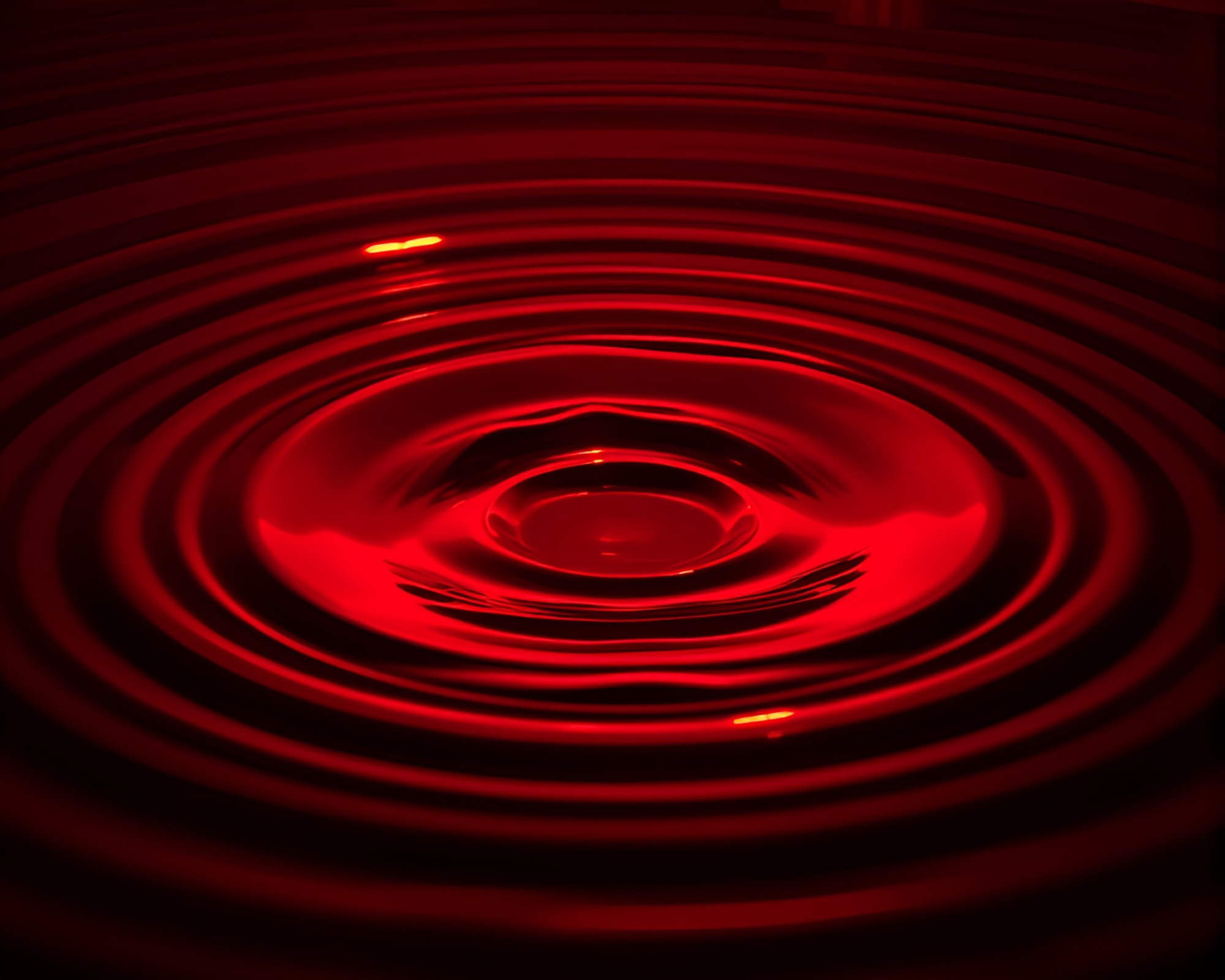 Mesmerizing Water Reflection Rings: Ruby Red Illumination – free AI stock image