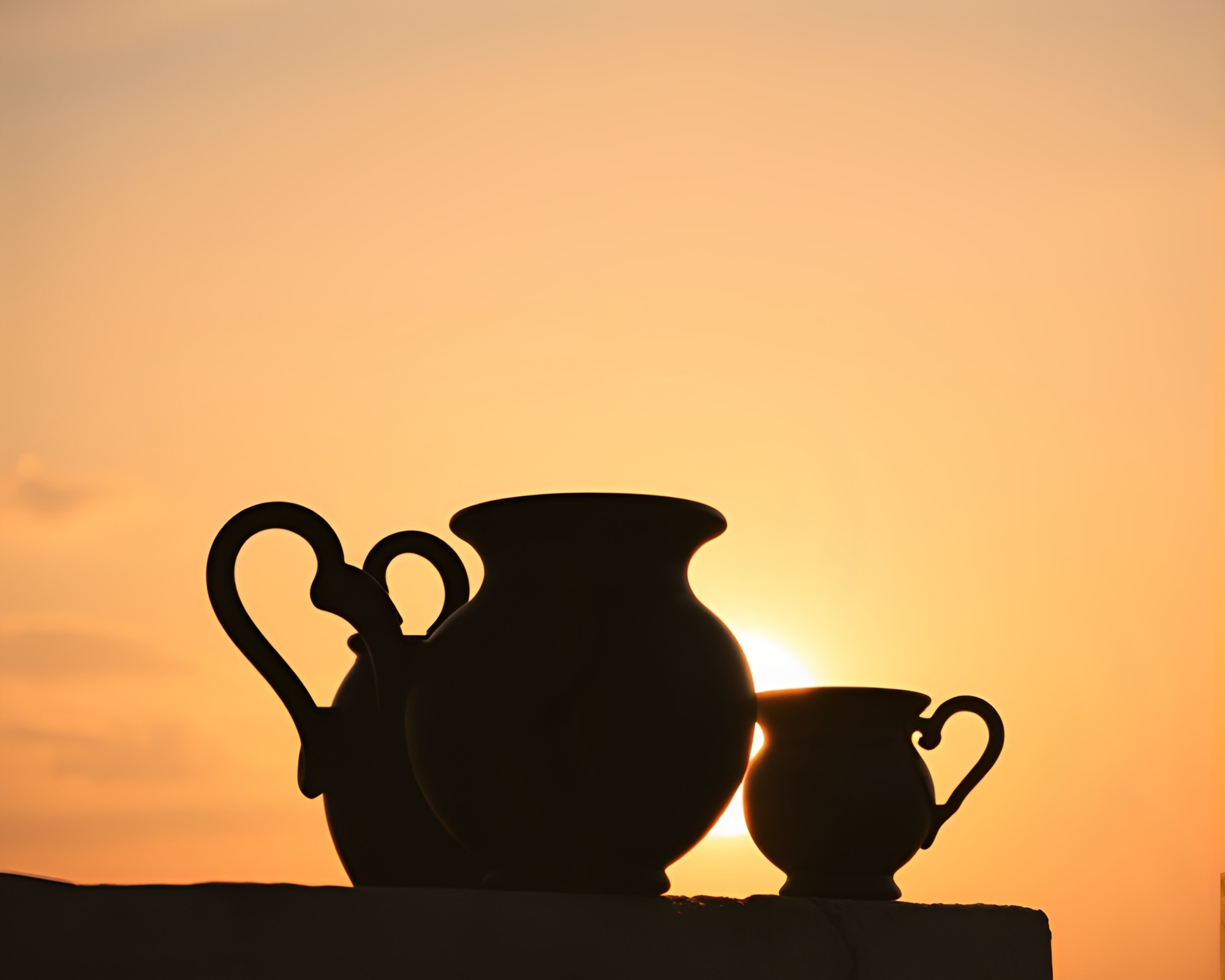 Rustic Pottery Casting Shadows at Sunrise – free AI stock image